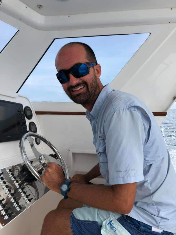Nicolas Jamin smiling aboard a boat
